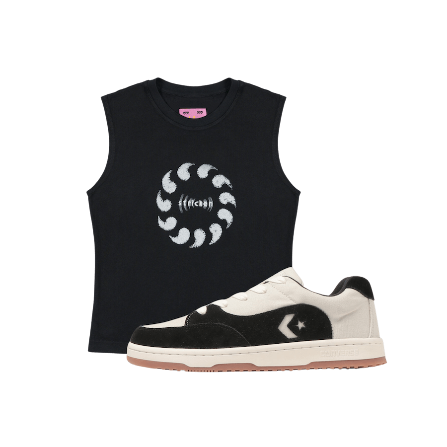 A black tank top and converse skate shoes.